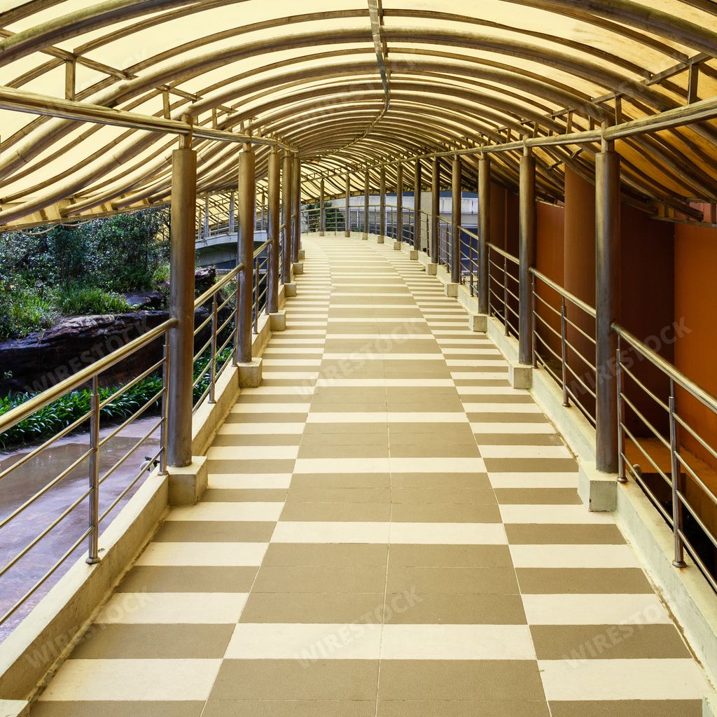 A pedestrian bridge in the national park of Bokor Village in Kampot, Cambodia over the river