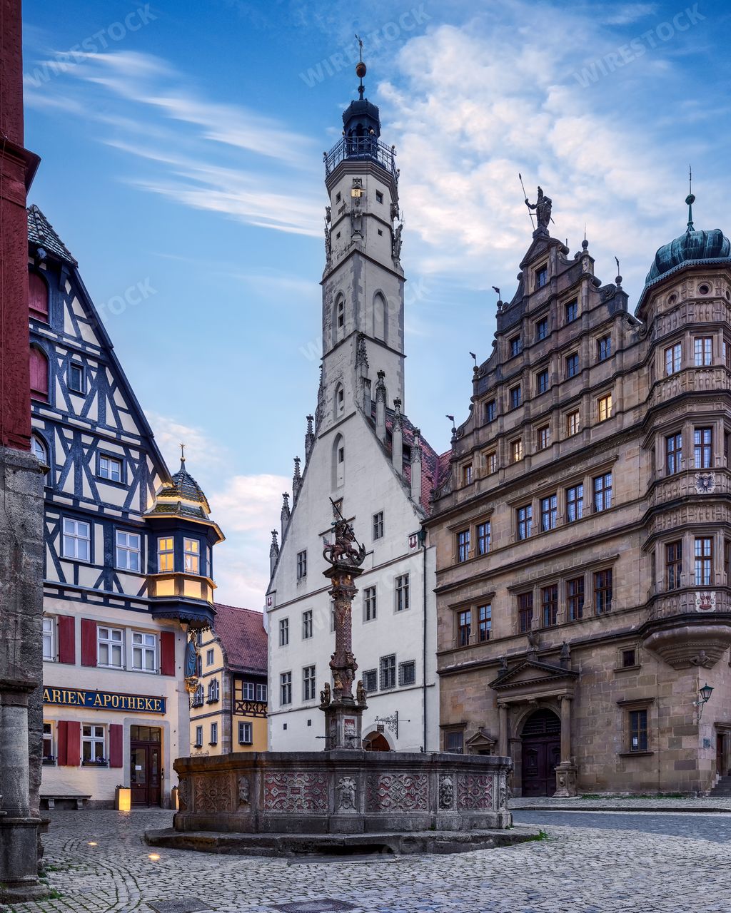 The view of St George fountain in the market square of Rothenburg ob der Tauber. Bavaria, Germany