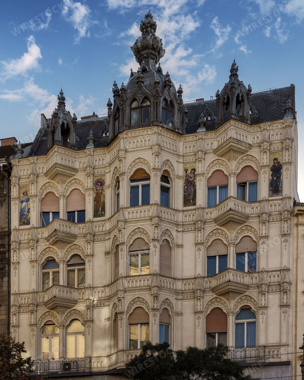 The facade of an old, historic building located in Budapest, Hungary, in Europe