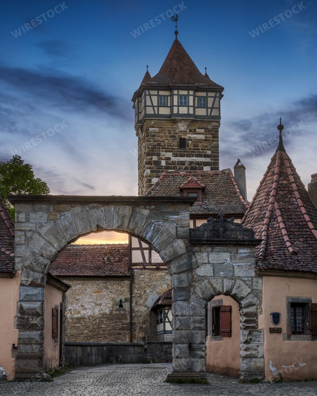 The stone gate and Roder Tower in Rothenburg ob der Tauber. Bavaria, Germany