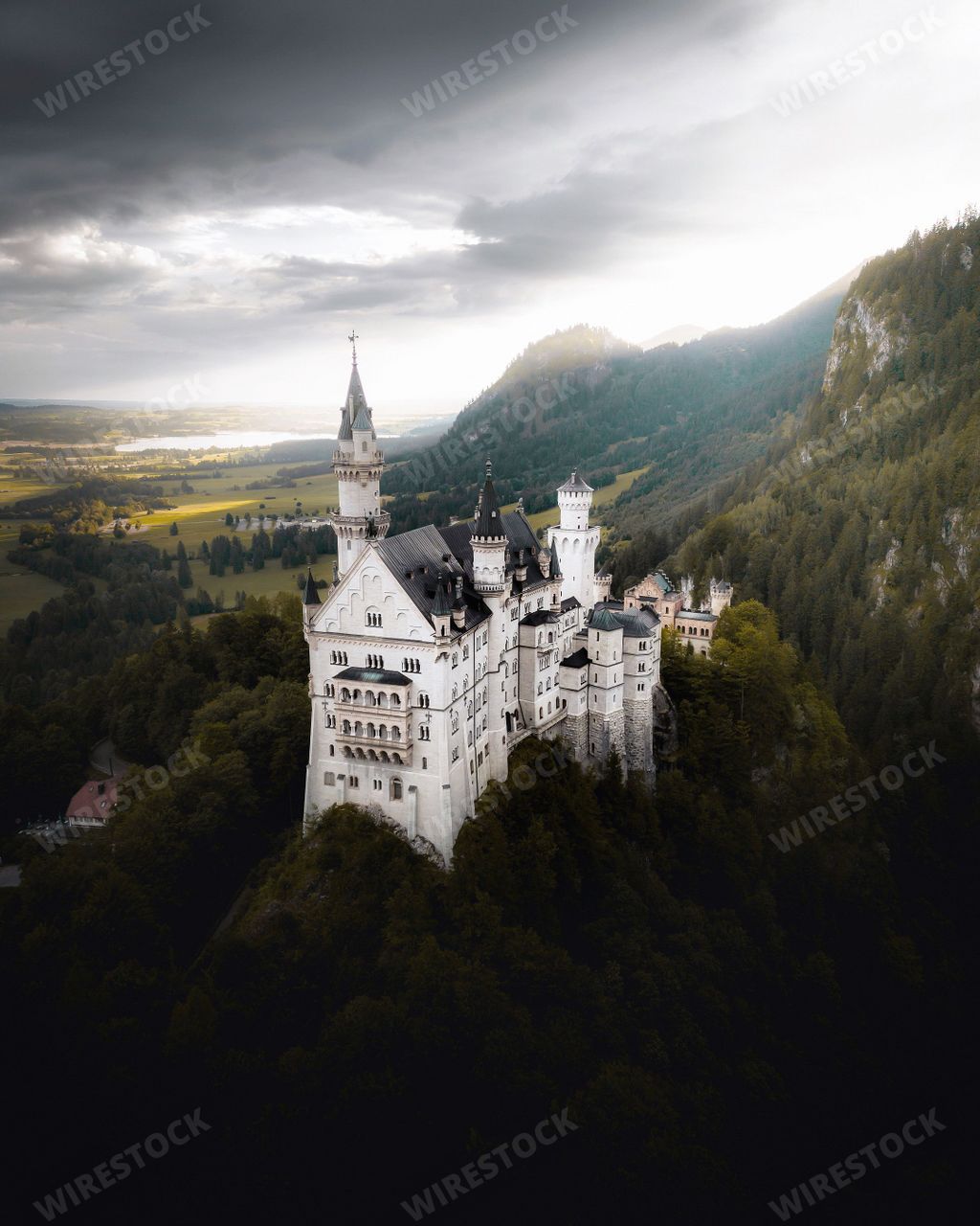 A breathtaking aerial view of Neuschwanstein Castle on a hill in Bavaria, Germany