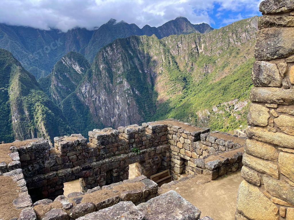An aerial view of the Machu Picchu Palace ruins, an Inca site located in the Sacred Valley of the Incas in Peru