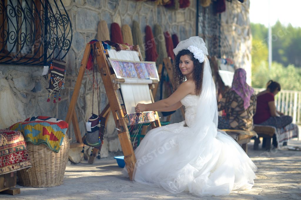 Young bride and bridegroom getting married wedding day in suit and wedding  dress.