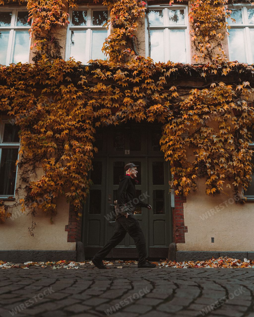 A stylish young man walking in the streets of Malmo, Sweden