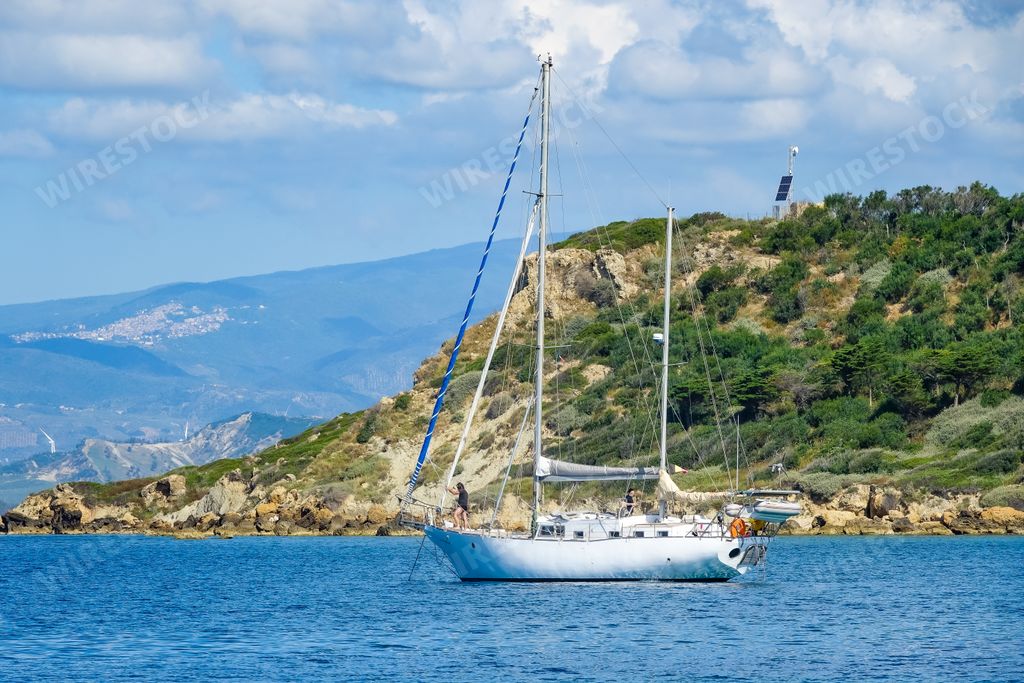 A ship in the sea under the cloudy skies in Italy