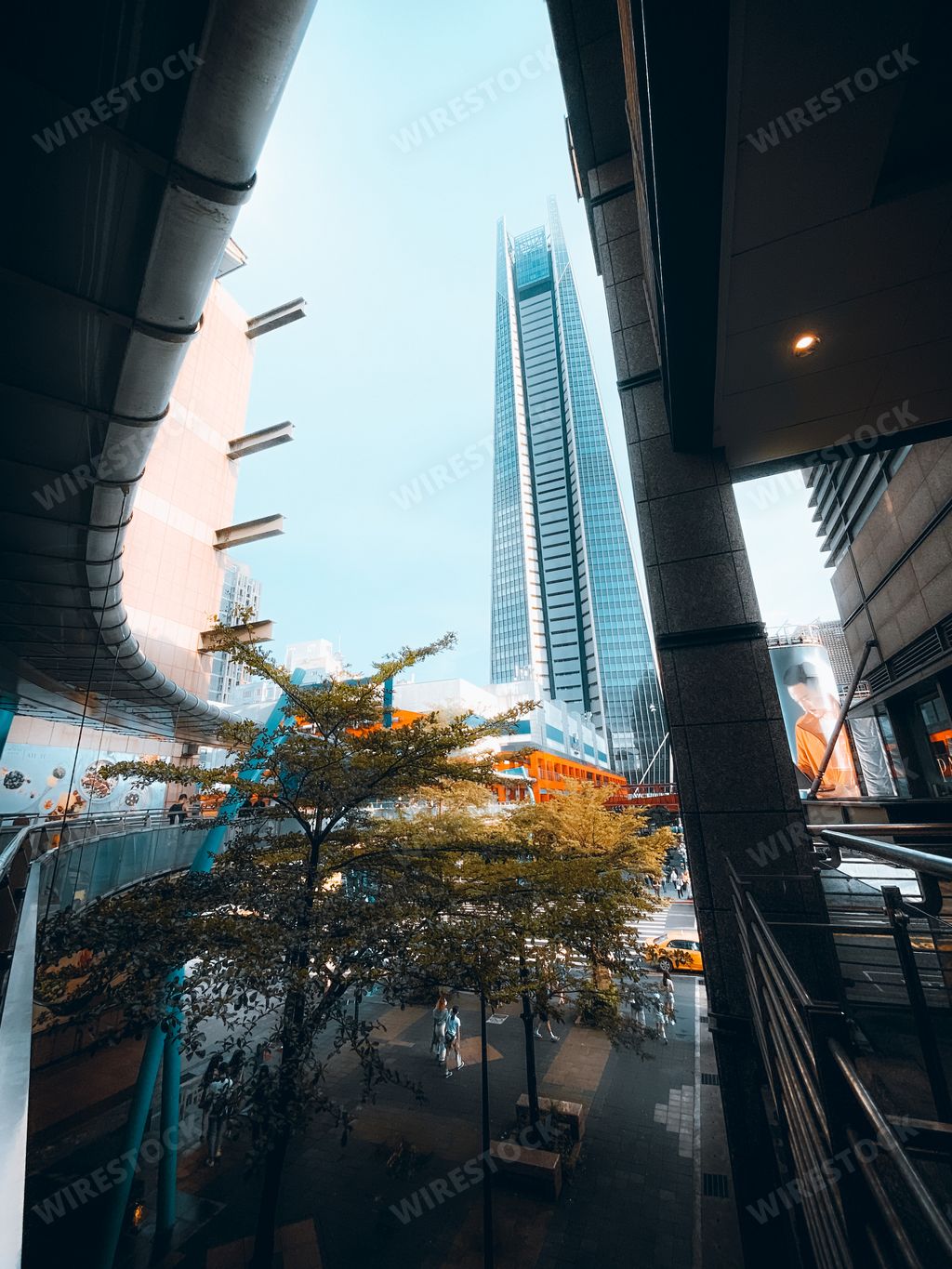 The city street view with modern high buildings against a blue sky in Taipei, Taiwan
