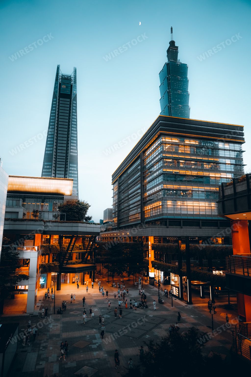 The city street view with modern buildings against a blue sky in Taipei, Taiwan
