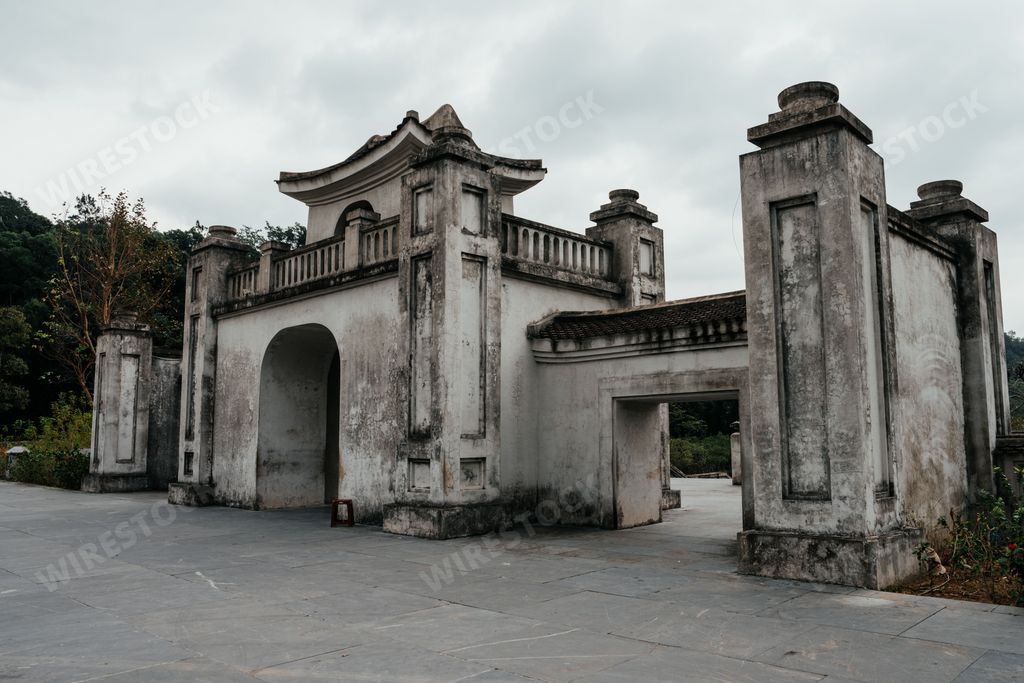 An Asian Buddhist Temple and Shrine in Northeast Vietnam with Mountains in the Background