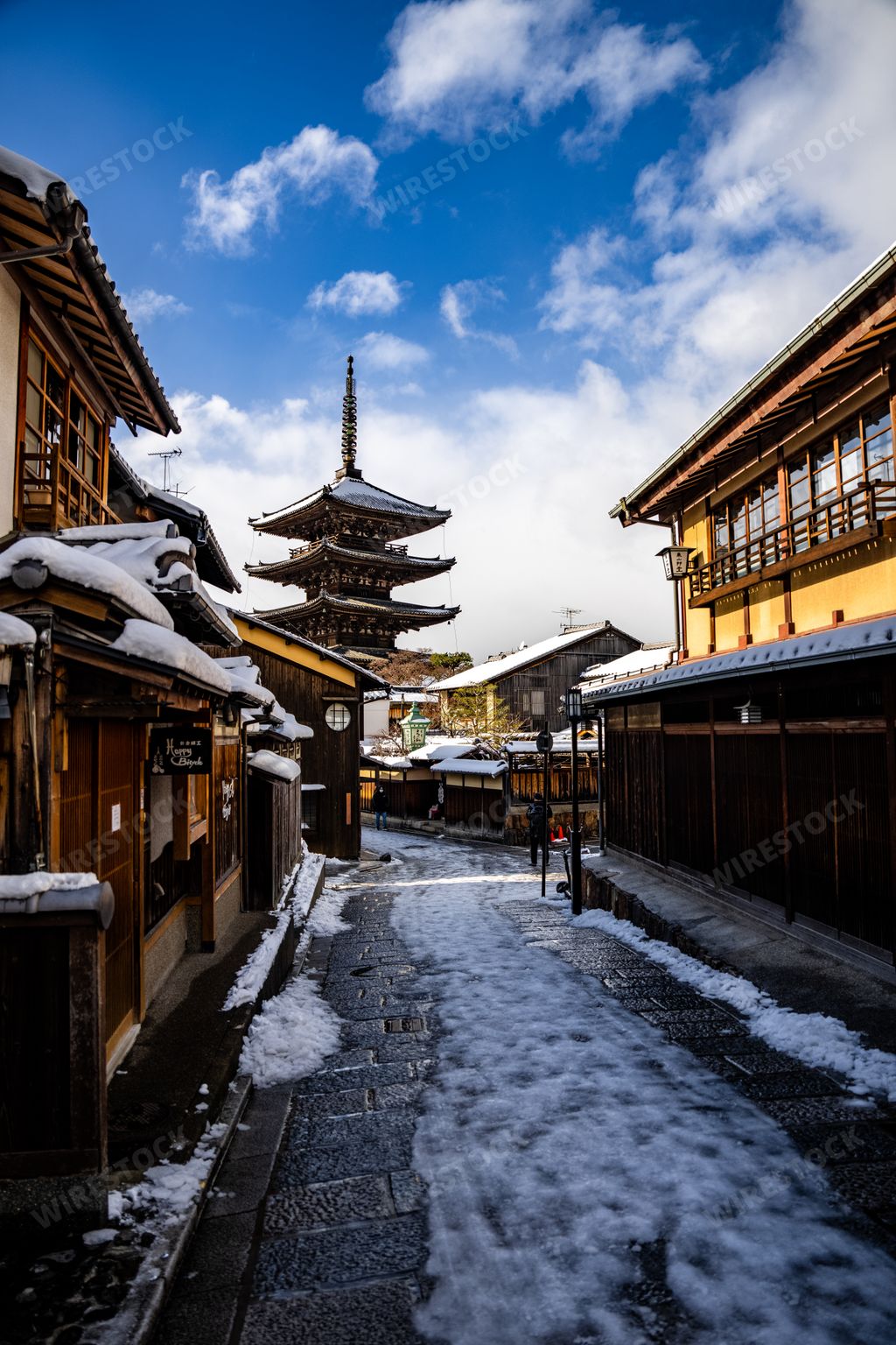 Rare view of a Snow Covered Yasaka Pagoda from Sannen Zaka Street in the old town district of Kyoto, Japan