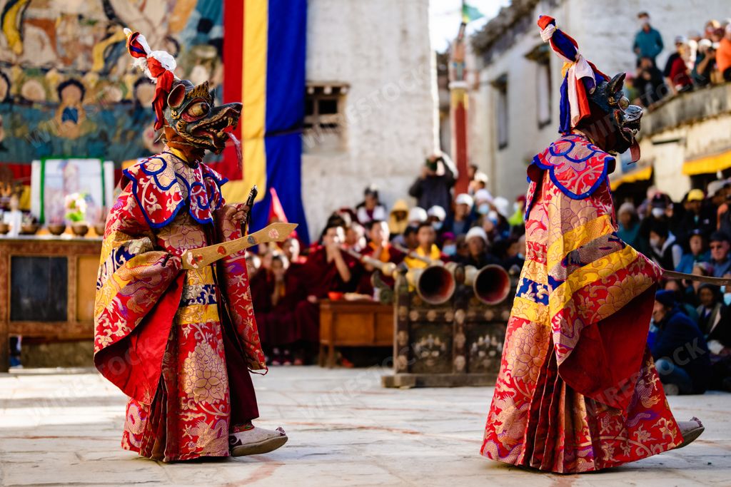 The Tibetan Buddhist dancer in traditional demon spirit ghost clothing doing the ritual dance at the Tiji Festival in Nepal