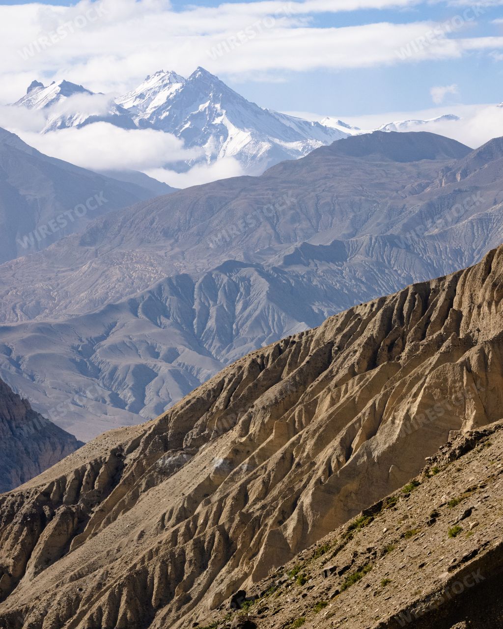 A vertical shot of the beautiful Nilgiri and Annapurna mountain ranges in the Himalayas, Nepal