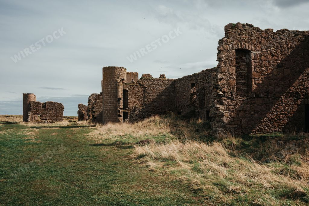 The ancient ruins of Castle Slains in Aberdeenshire, Scotland, UK. The castle inspired Dracula and sits on the Eastern coast of Scotland.