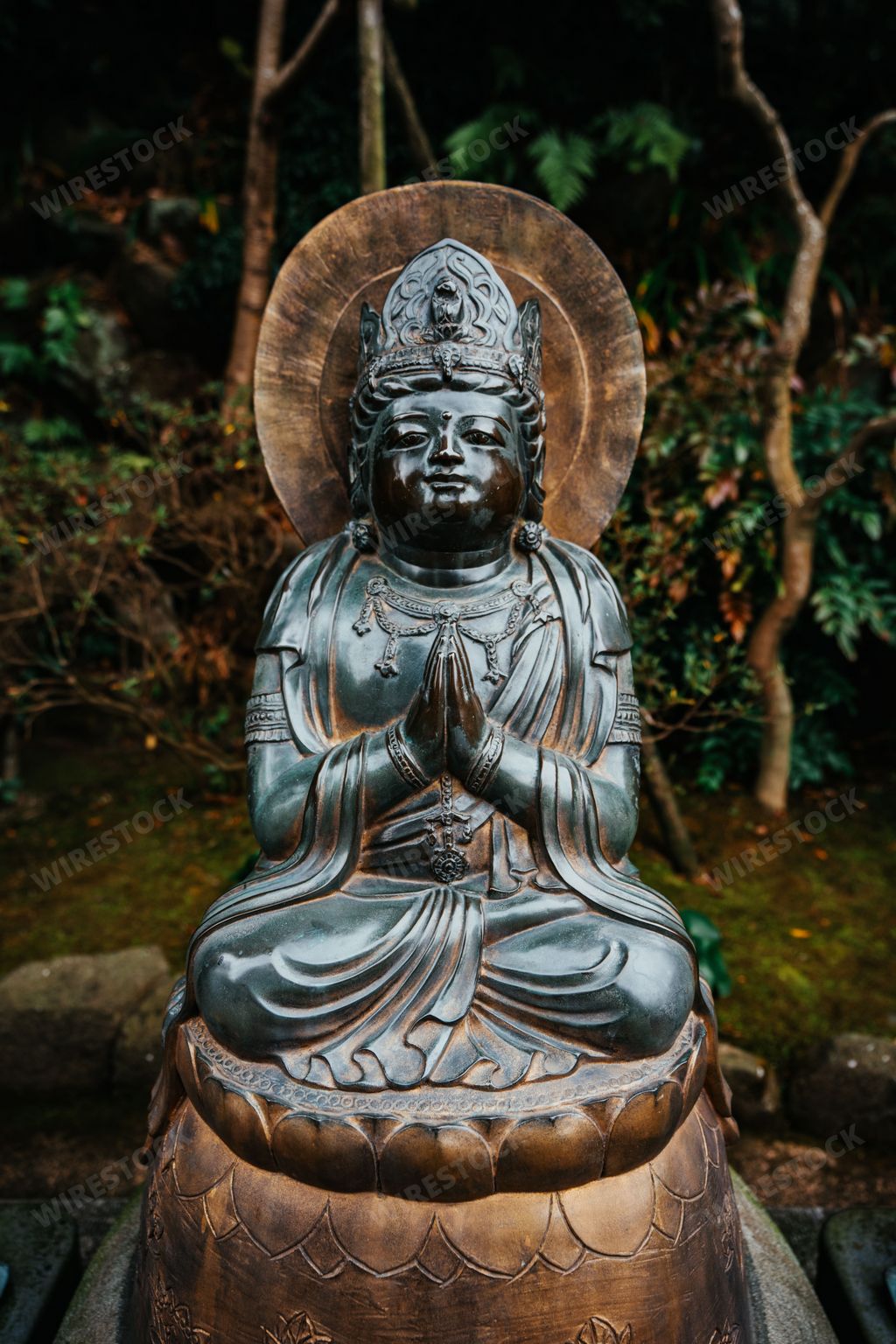 A bronze statue of the Hasedera Hozo Bosatsu Amida Buddhist Shinto Statue at Hasadera Temple in Kamakura, Japan