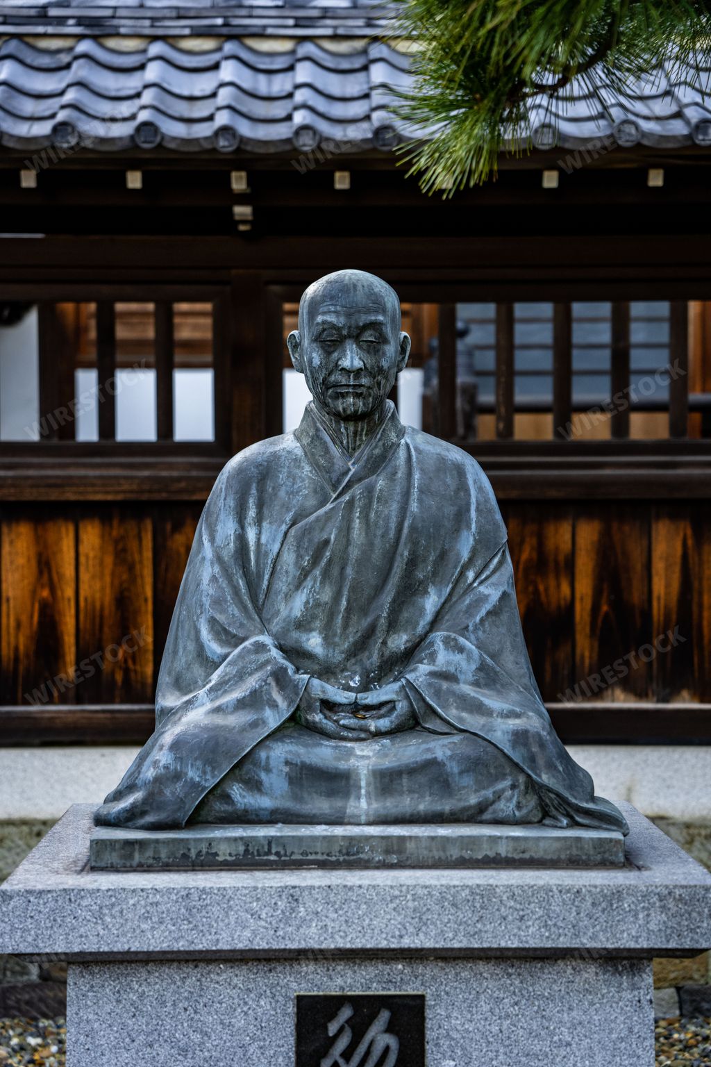 The Statue of an ancient Japanese Buddhist monk and hero at Sengakuji Buddhist Temple in Tokyo Japan.