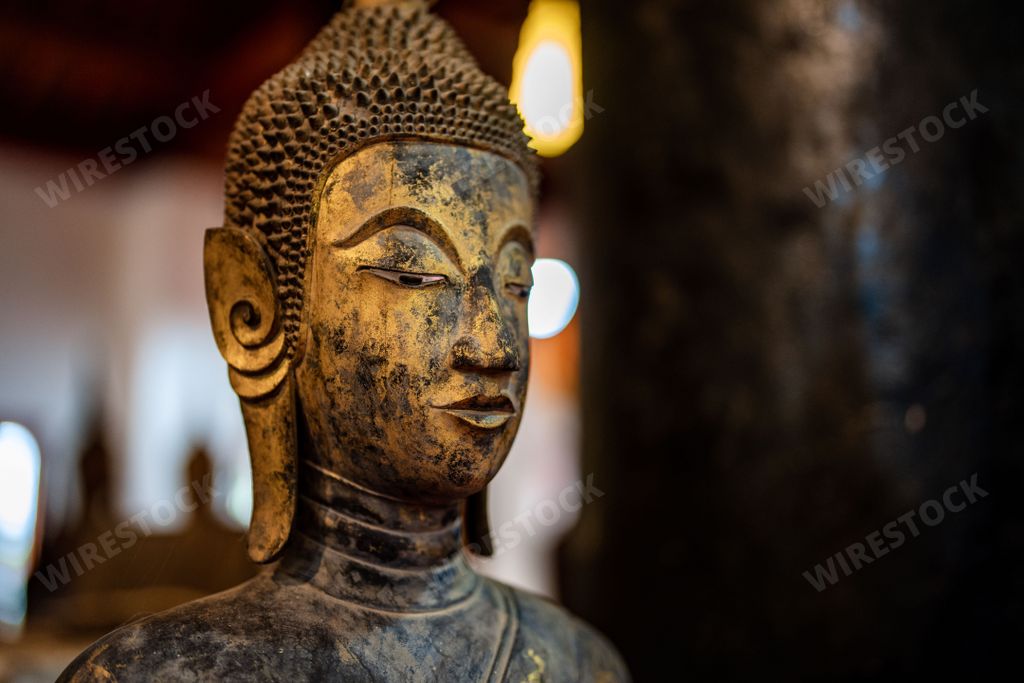 An Ancient Buddha statue at Wat Visoun in Luang Prabang, Laos, Southeast Asia