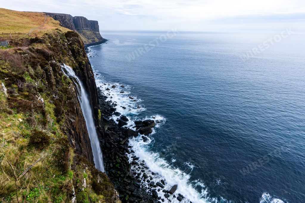 The beautiful view of Mealt falls, also named Kilt Rock Waterfall. Isle of Skye, Scotland, UK.