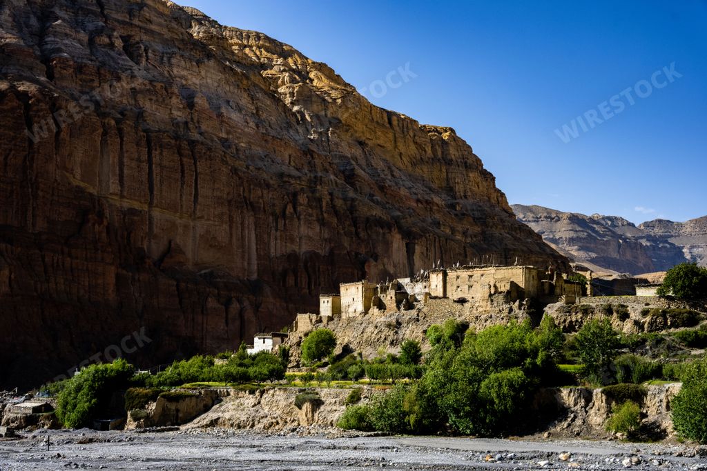 The Old Fort at Chusang, deep in the Kali Gandaki Gorge with a blue sky in the background, Mustang, Nepal