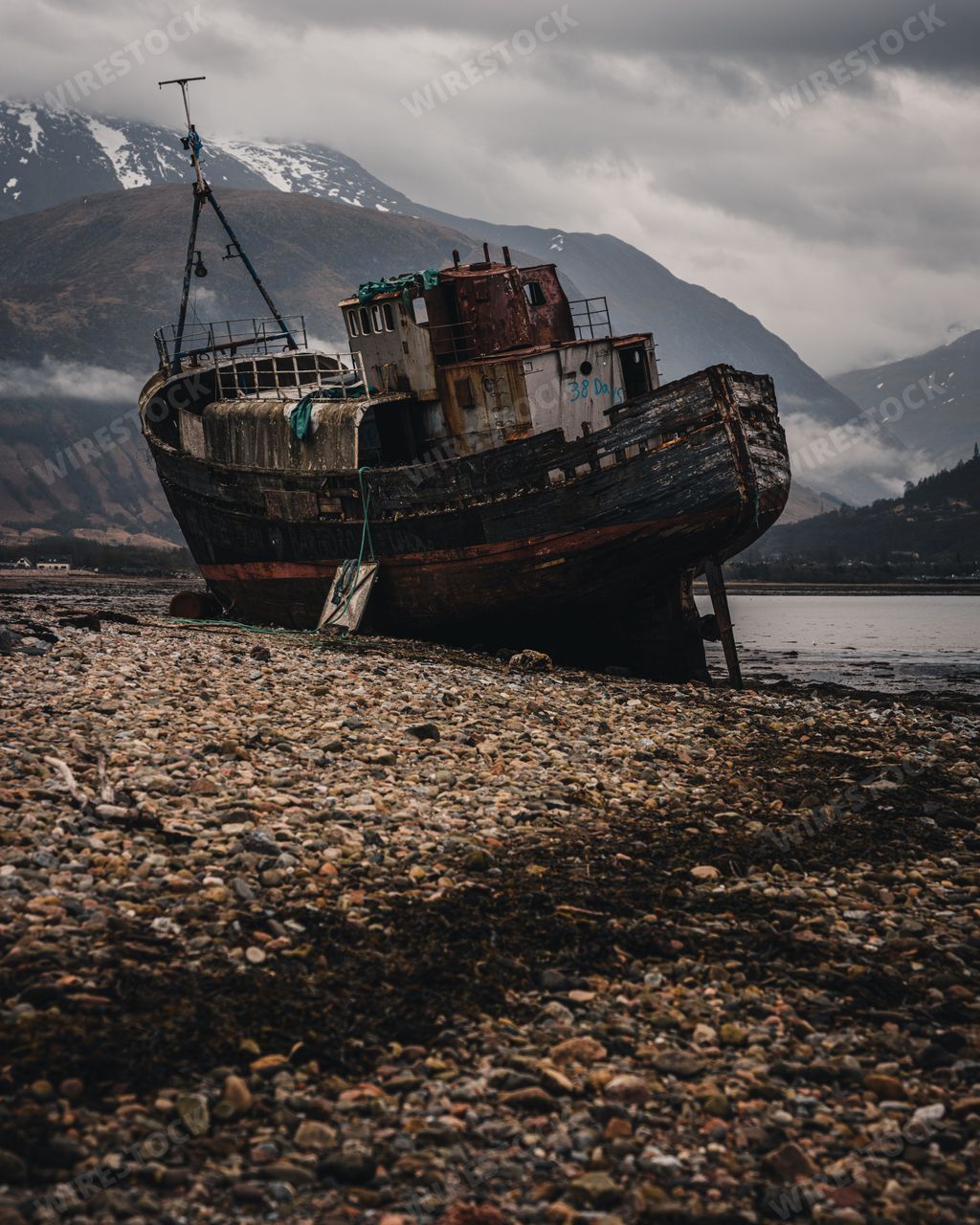A vertical of an old boat of Caol, Corpach Shipwreck in the Scottish Highlands, UK