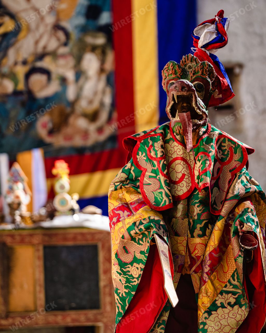 A Tibetan Buddhist in traditional demon ghost clothing in Ritual Dance at the Tiji Festival in Nepal