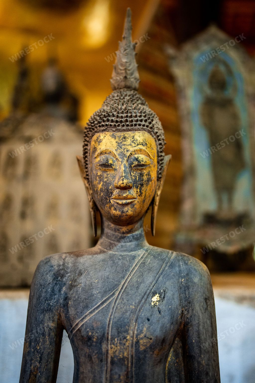 An Ancient Buddha statue at Wat Visoun in Luang Prabang, Laos, Southeast Asia