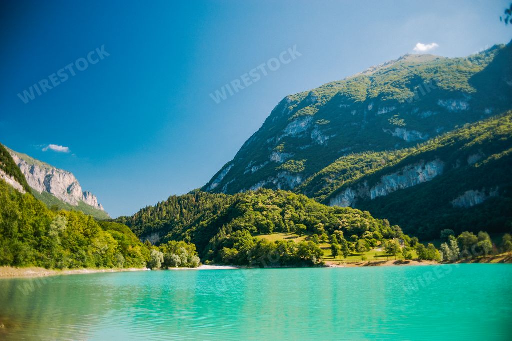 A beautiful shot of scenic mountains and a lake on a sunny day