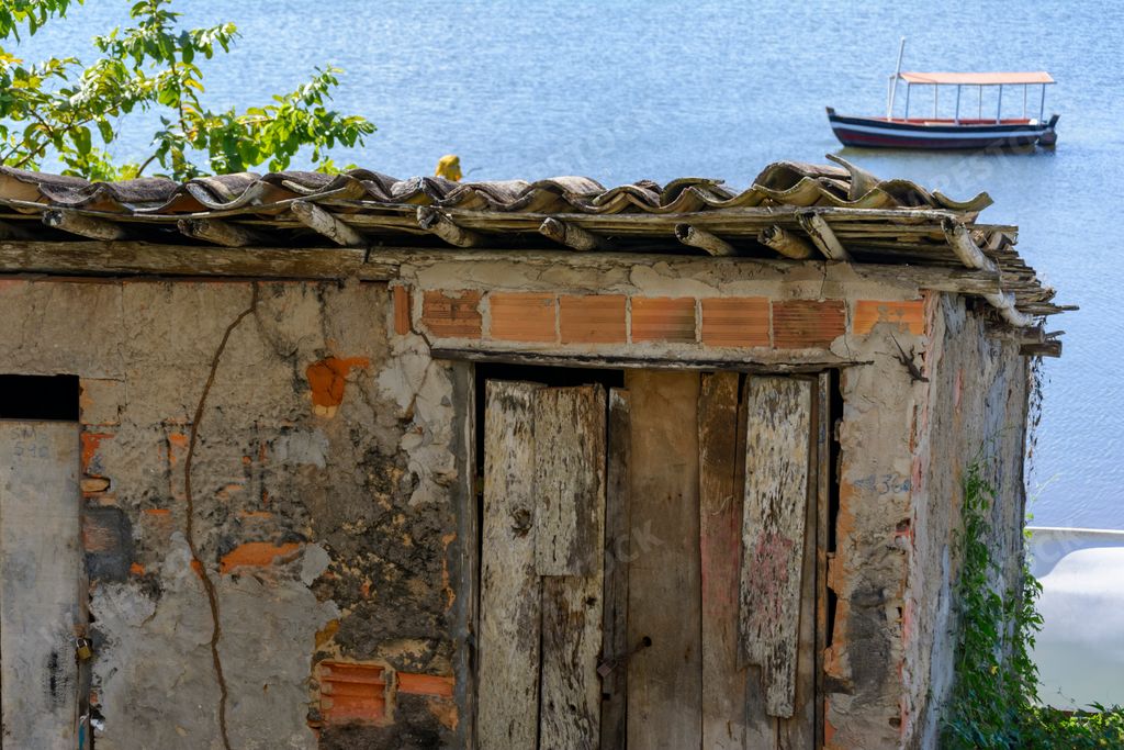 Houses made of clay and cement on the banks of the grand Paraguacu river, located in the Brazilian state of Bahia.