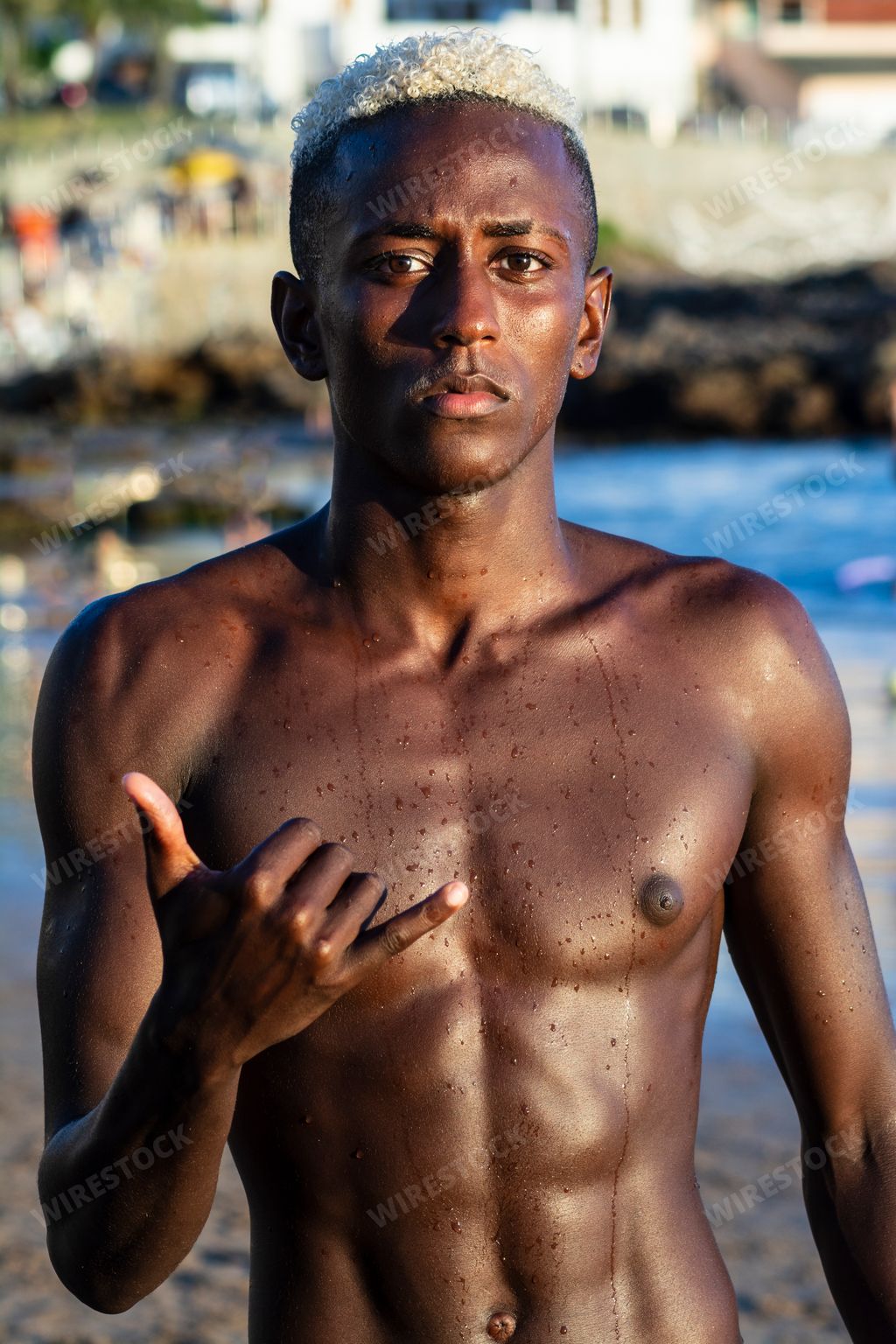 A Brazilian young boy portrait on the beach in Salvador, Bahia, Brazil