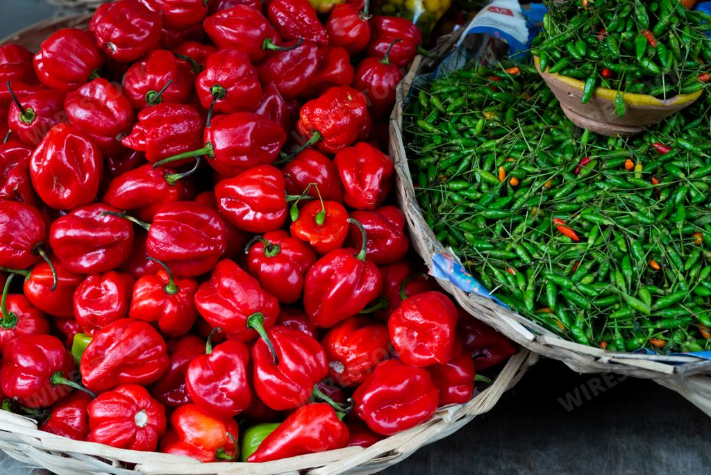A closeup of a pile of red peppers for sale in the market in Sao Joaquim