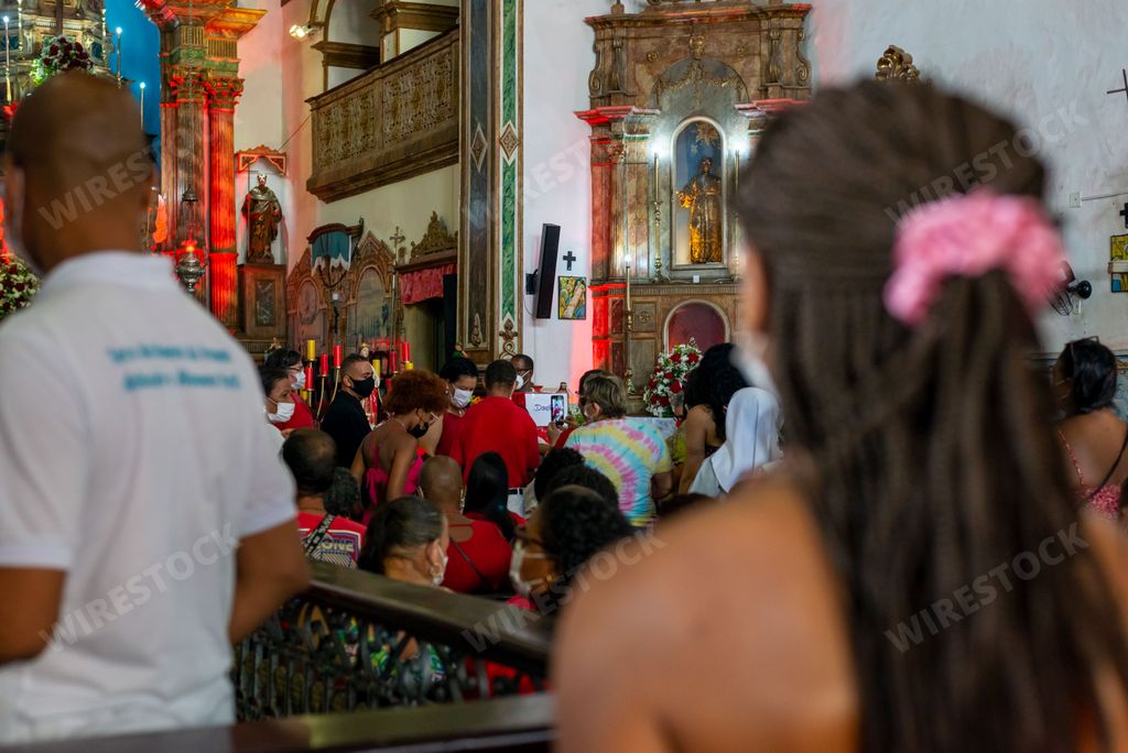 Devotees of Santa Barbara during mass in the church of Rosario dos Pretos in Largo do Pelourinho in the city of Salvador.