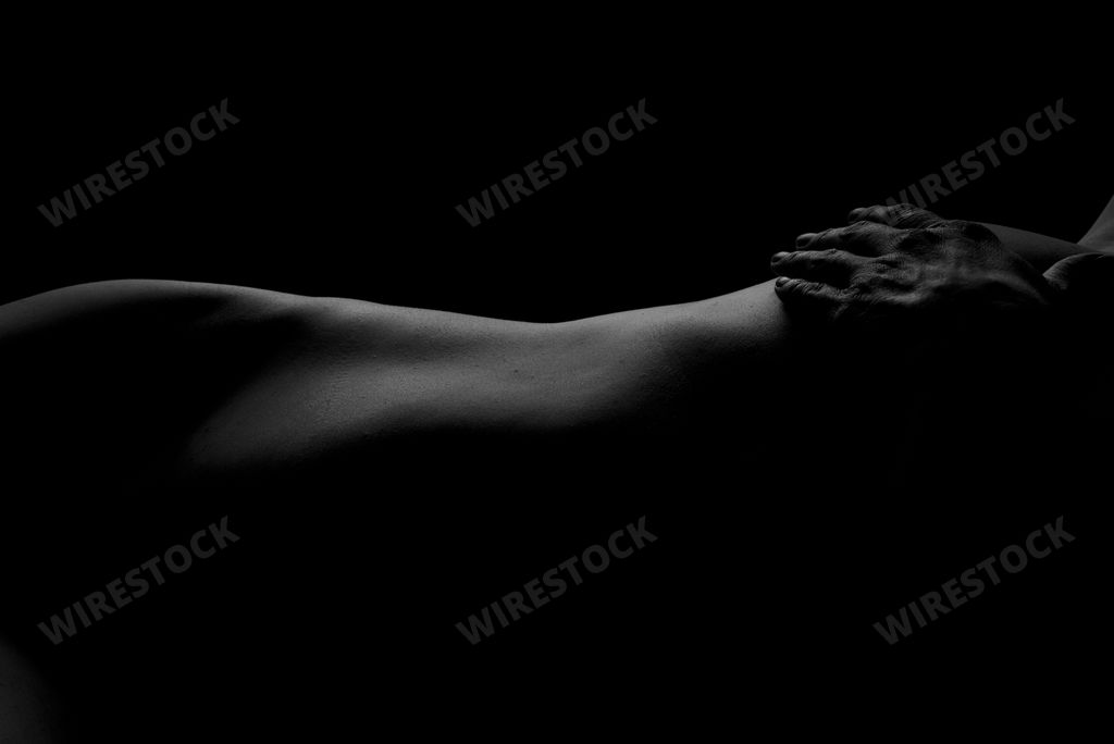 Female Nude silhouette. Black and white portrait. Sexy mature woman. Young adult with Naked Body.
