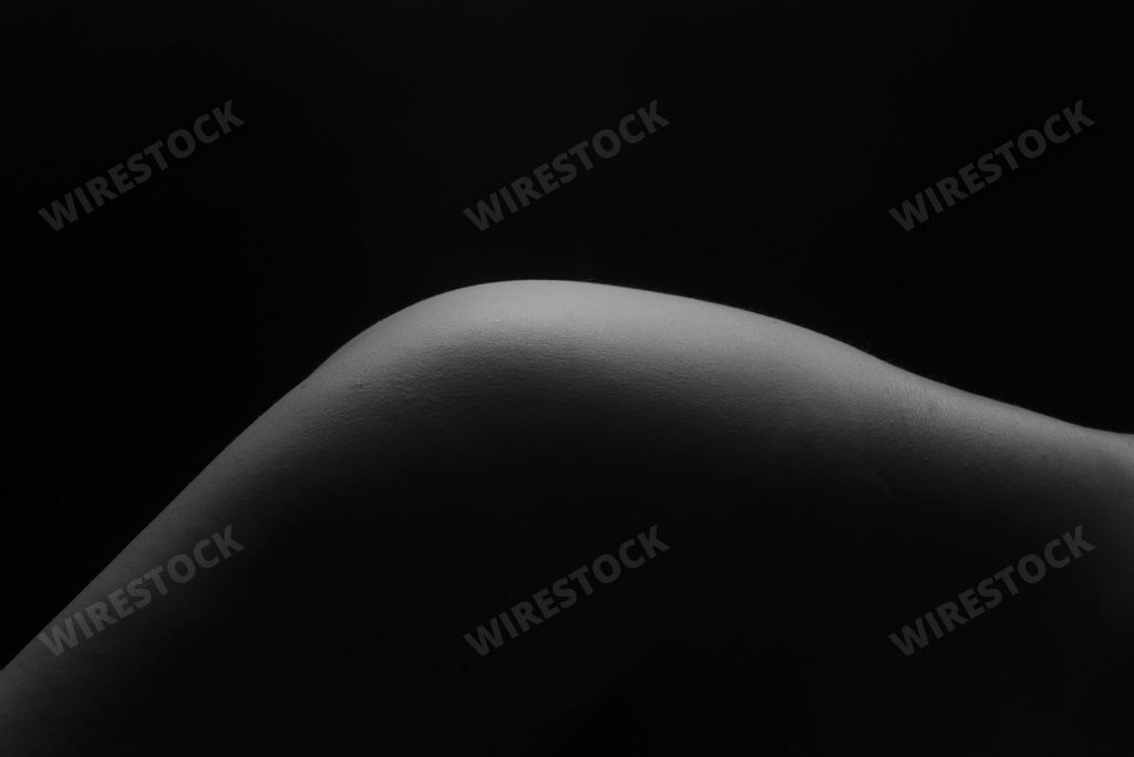 Female Nude silhouette. Black and white portrait. Sexy mature woman. Young adult with Naked Body.
