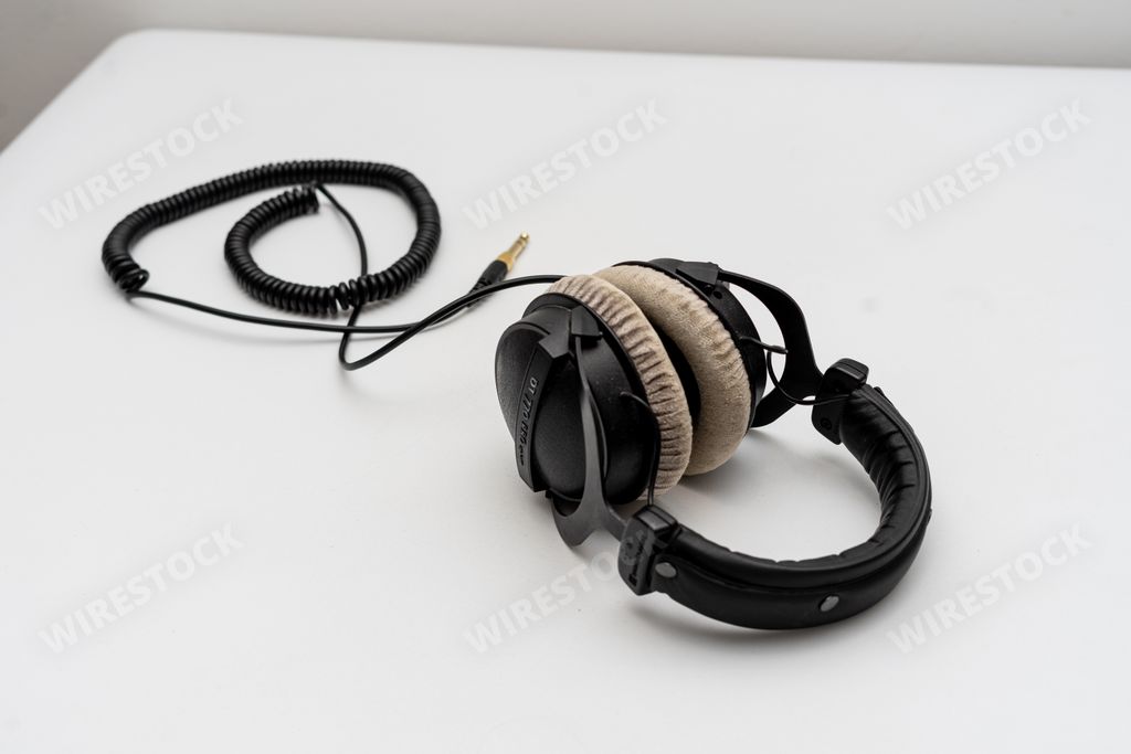 A closeup of DT770 Beyerdynamic headphones, studio headphones for professional music production on a white table in Berlin, Germany