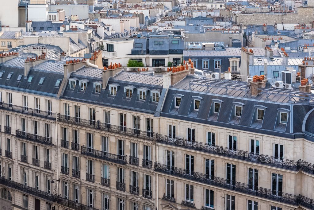Paris, ancient and modern buildings in the center, typical parisian facade and windows, aerial view from the Saint-Jacques tower