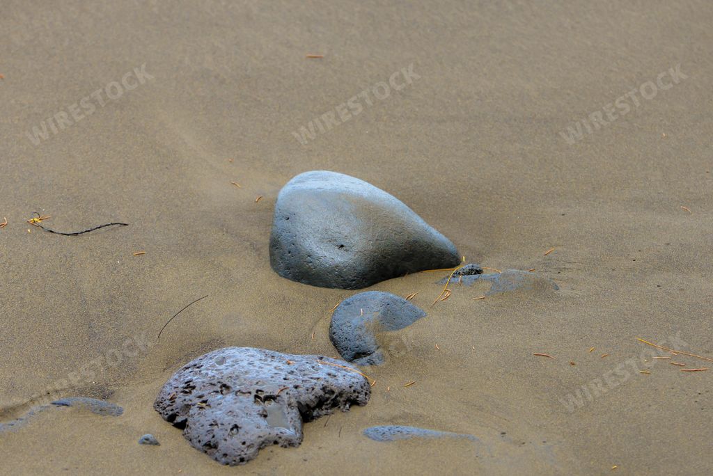 Black sand beach, volcanic stones, Tahiti, French Polynesia