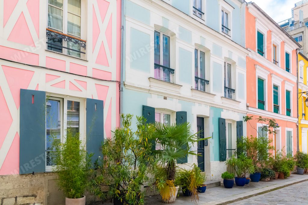 Paris, colorful house rue Cremieux, typical street
