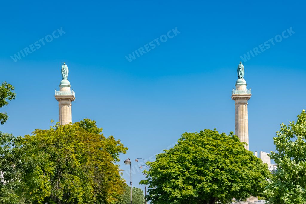 Paris, place de la Nation in the 11e arrondissement, in summer, with the two columns