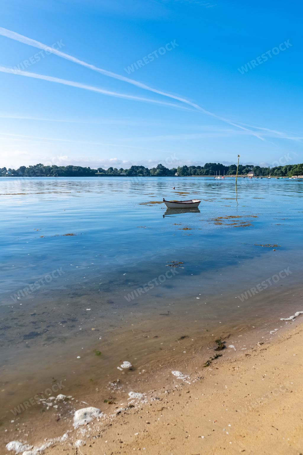 Brittany, Ile-aux-Moines island at sunrise, with a wooden row boat