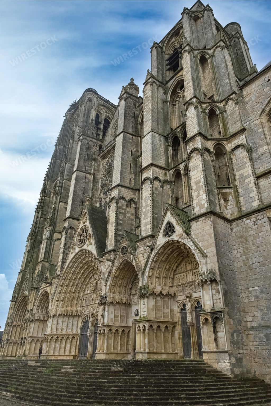 The historic Saint-Etienne cathedral under a sunny sky in Bourges, France
