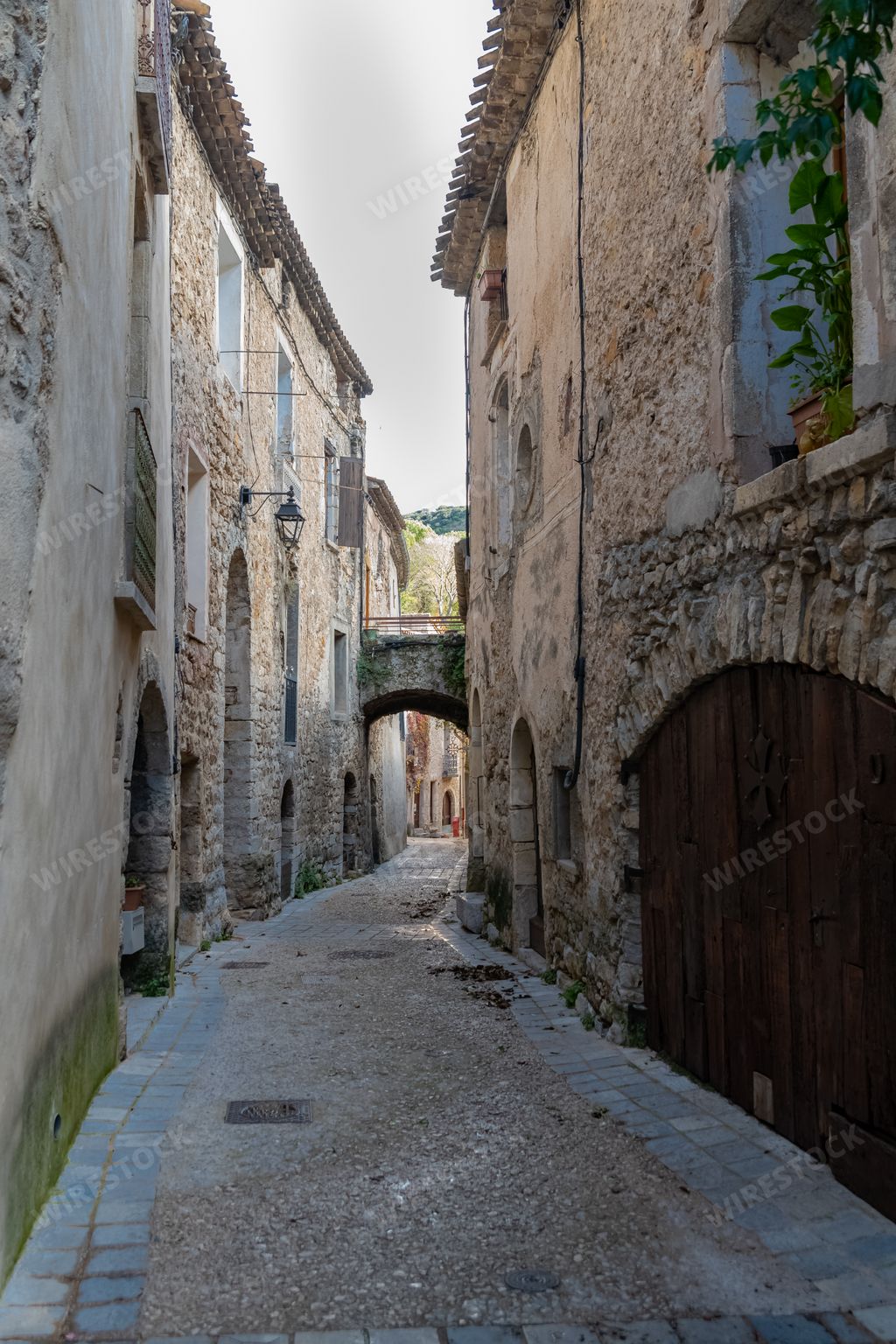 Saint-Guilhem-le-Desert in France, view of the village, typical street and houses