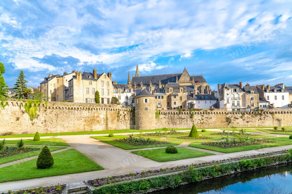 Vannes, old houses in the ramparts garden, with the cathedral in background