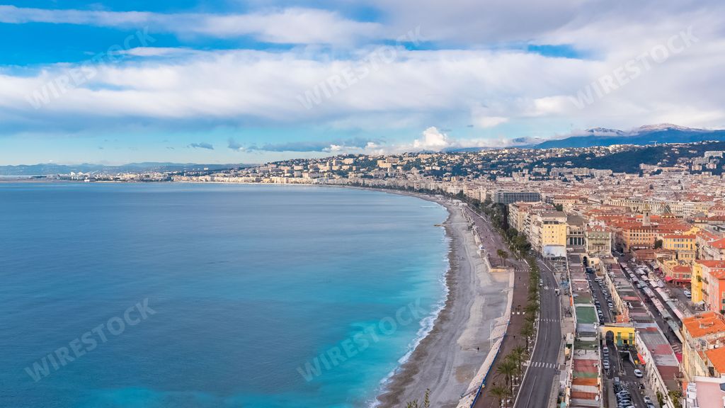 The town of Nice, view of the beach, on the French Riviera, with the city and the Promenade des Anglais