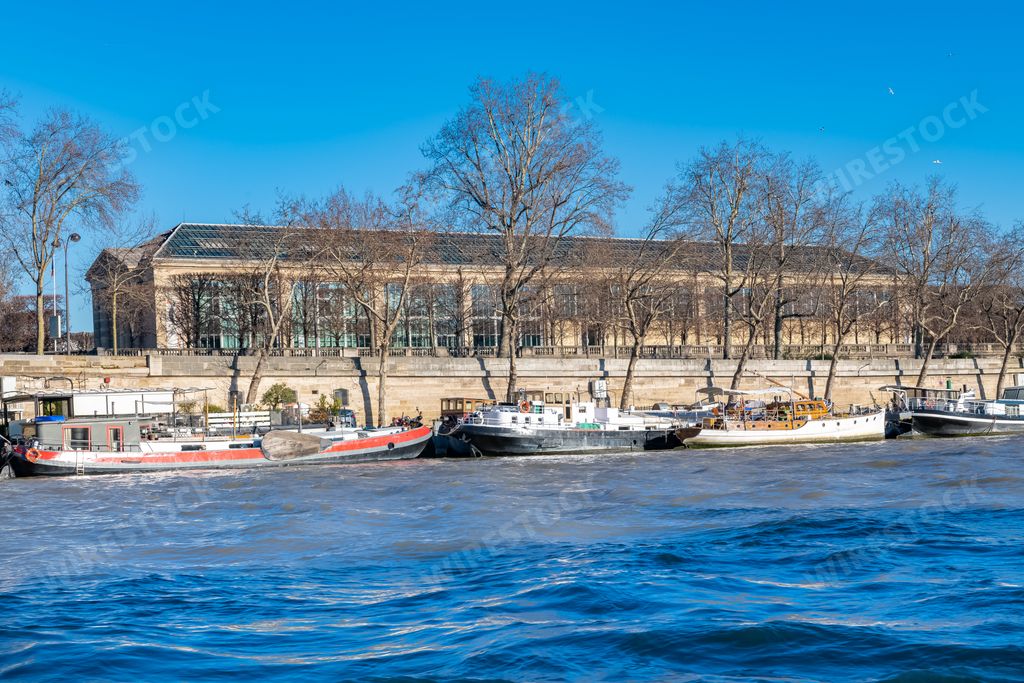 Paris, houseboats on the Seine, with the Orangerie in background