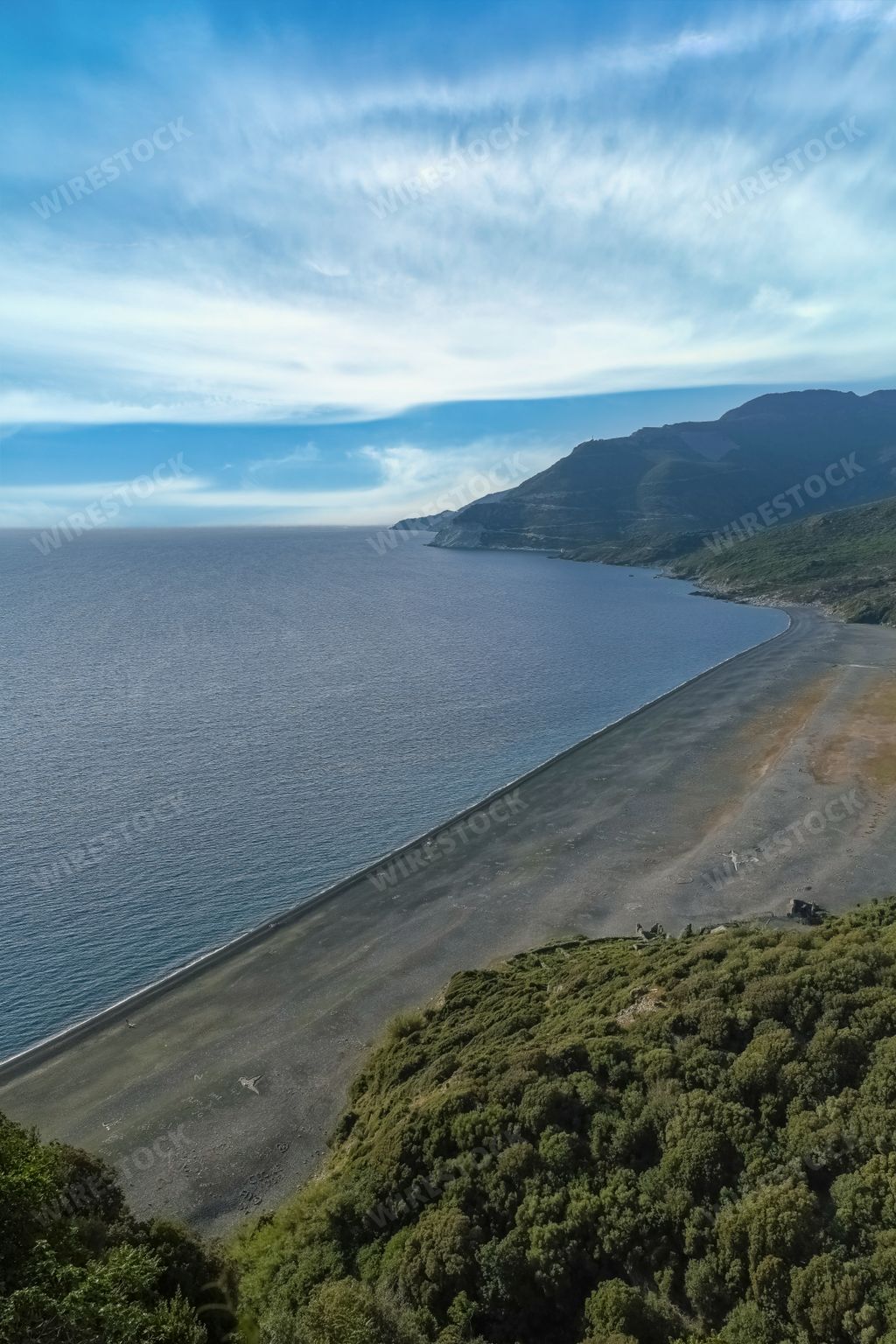 Corsica, aerial view of the Nonza beach, with black pebble, in the cap Corse