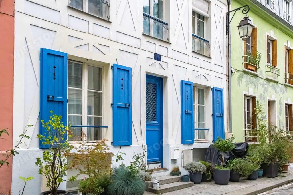 A scenic view of colorful houses rue Cremieux in Paris, France