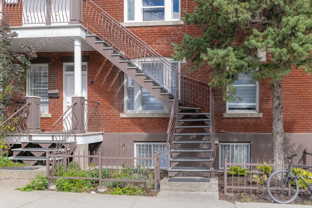 The typical Victorian houses with an exterior staircase in the Plateau Mont-Royal district, Montreal