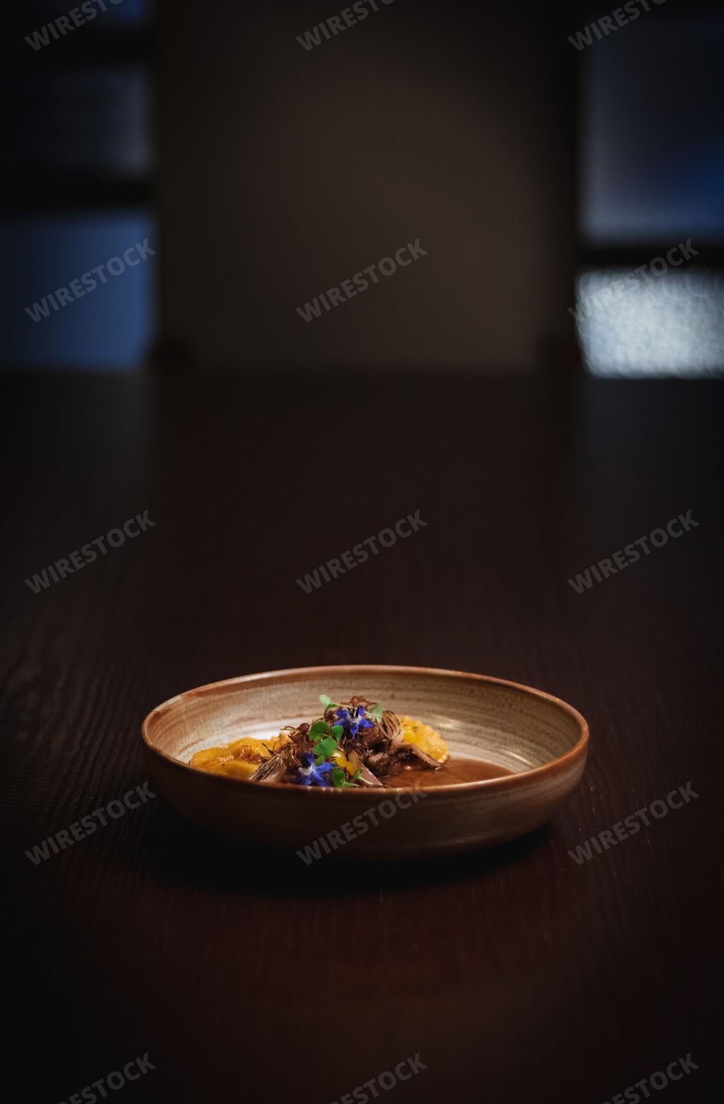 A selective of a beautifully decorated vegan dish in a white bowl