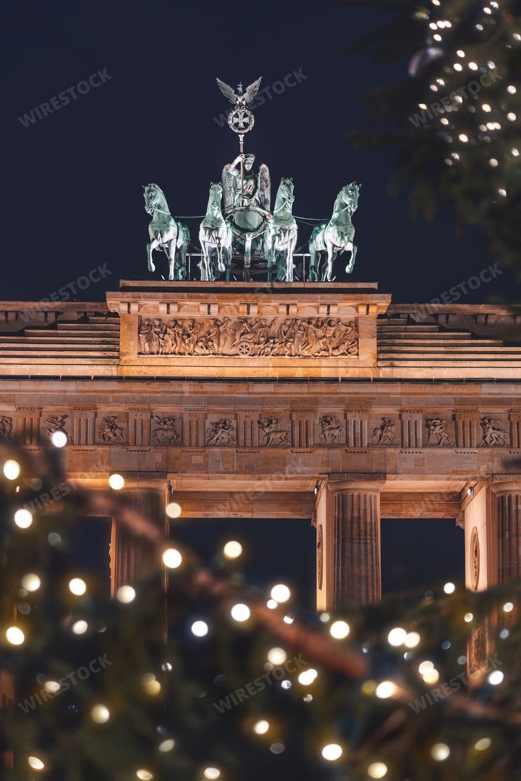A vertical shot of Brandenburger Gate at night. Berlin, Germany.