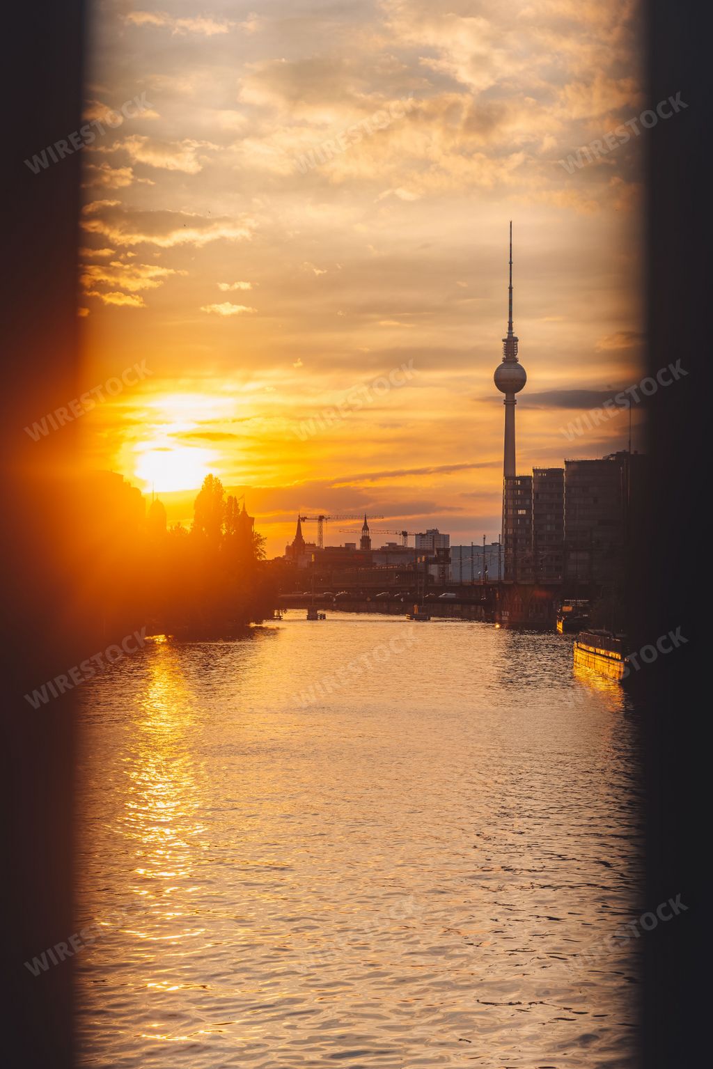 A vertical shot of the Berlin cityscape at golden hour, Germany