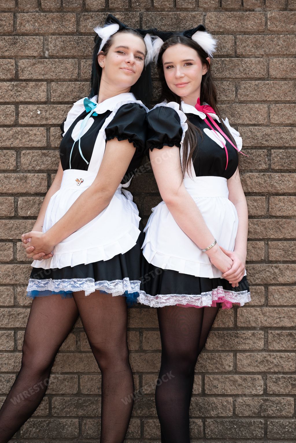 Two cosplay girls dressed as Japanese Maids