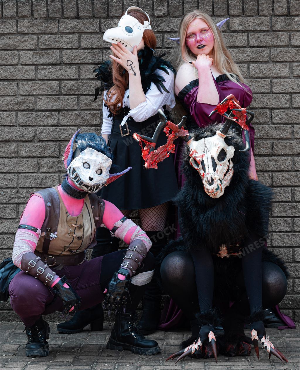 The female cosplayers at Comic-Con in monster outfits.